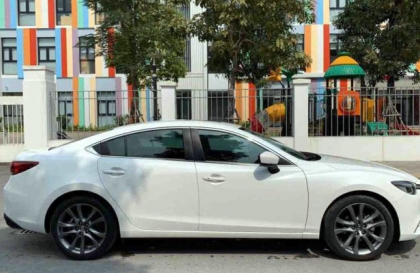 Mazda6 không tự gập gương khi mở khóa phải làm thế nào?